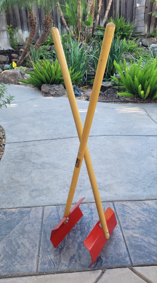 The TerraBOSS tool standing on a garden patio
